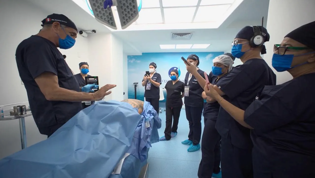 ISSCA physicians in scrubs during a hands-on ultrasound practice session